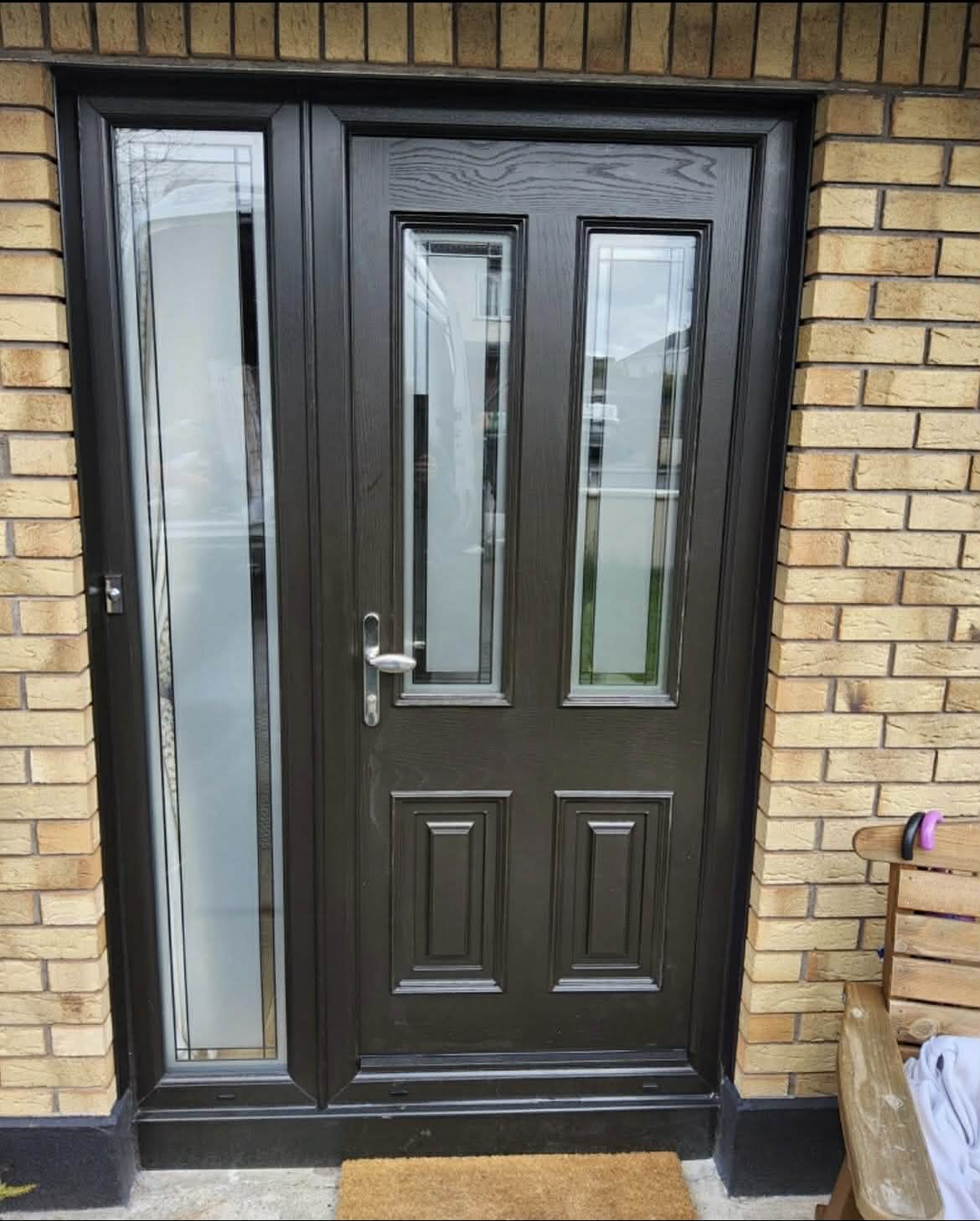 Black composite door with twin glass panels