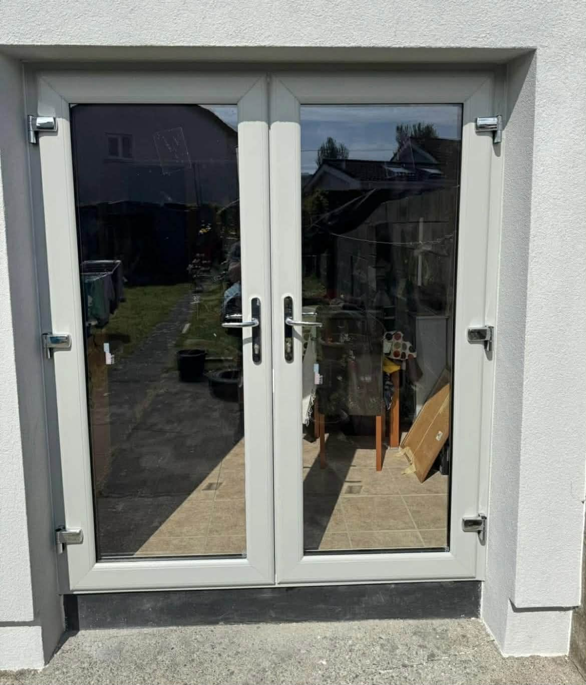 White PVC French doors with grey frame