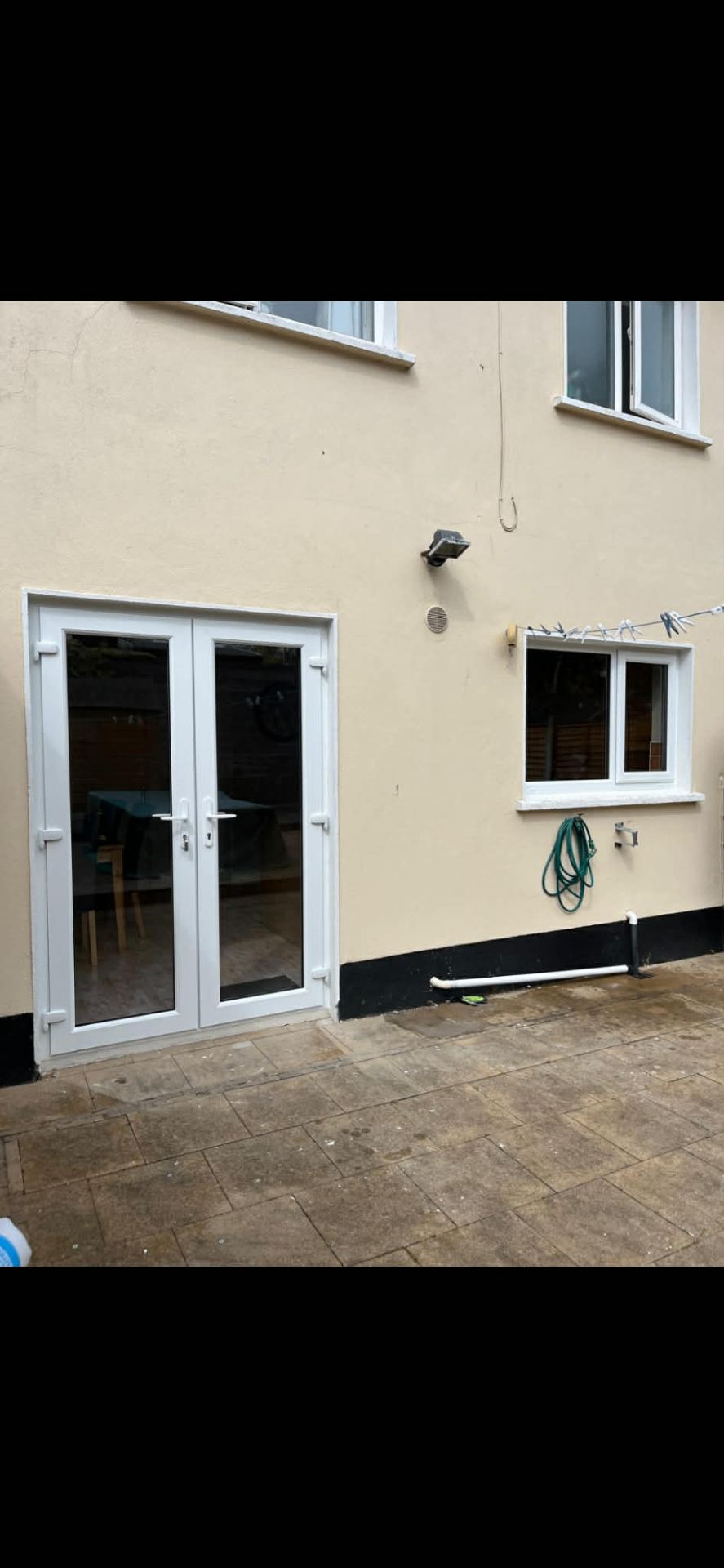 White PVC back doors with matching windows