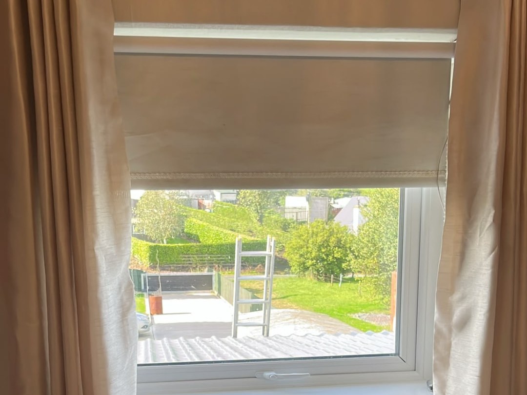 Top hung white uPVC window at a Dublin staircase landing