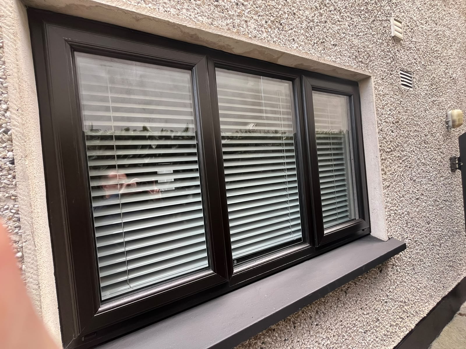 Rosewood brown triple casement window with matching sill